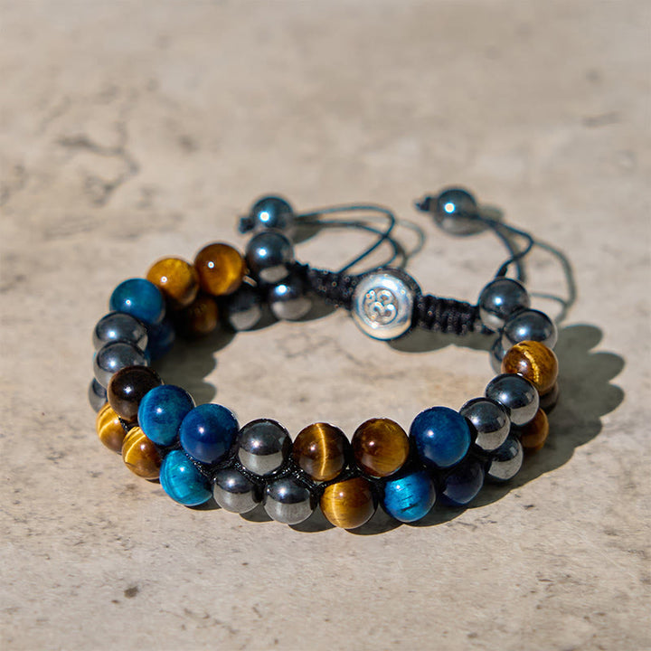 Buddha Stones Natürliches blaues Tigerauge Schwarzer Magnetit Om Muster Doppelreihige Perlen Stärke Armband