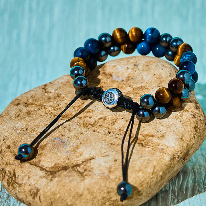 Buddha Stones Natürliches blaues Tigerauge Schwarzer Magnetit Om Muster Doppelreihige Perlen Stärke Armband