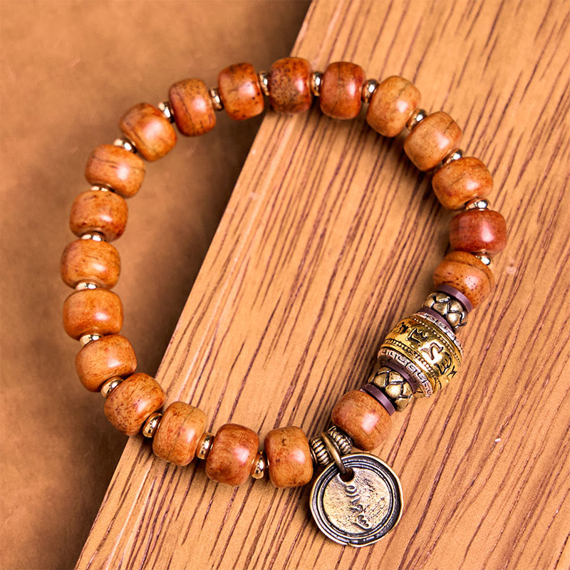 Buddha Stones Natürliche tibetische Kamelknochen-Fassperlen OM Sanskrit Glücksschutzarmband