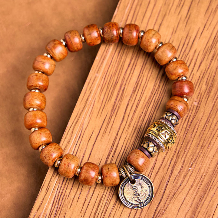 Buddha Stones Natürliche tibetische Kamelknochen-Fassperlen OM Sanskrit Glücksschutzarmband