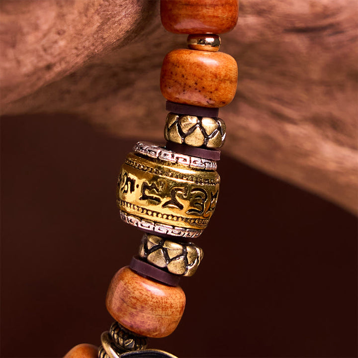 Buddha Stones Natürliche tibetische Kamelknochen-Fassperlen OM Sanskrit Glücksschutzarmband