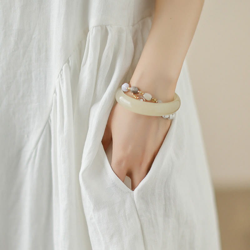 Buddha Stones FloralWhite Lässiges, ärmelloses Midikleid aus Baumwolle mit Knöpfen auf der Rückseite und Taschen - image 9