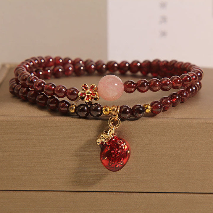 Buddha Stones Natürliches 3 mm ultradünnes Granat-Rosenquarz-Perlen-Geldbeutel-Glockenblumen-Schutzarmband