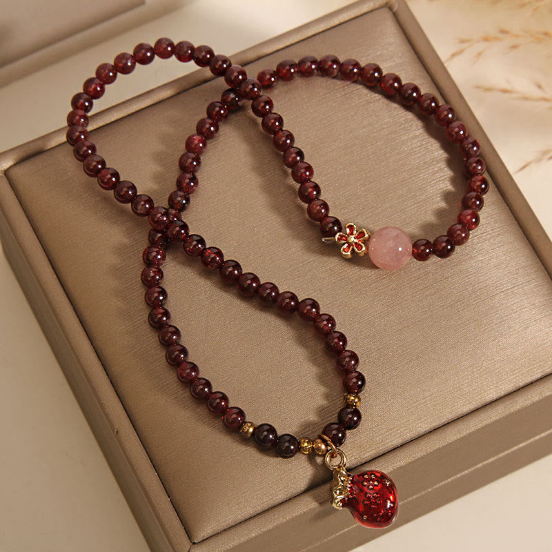 Buddha Stones Natürliches 3 mm ultradünnes Granat-Rosenquarz-Perlen-Geldbeutel-Glockenblumen-Schutzarmband