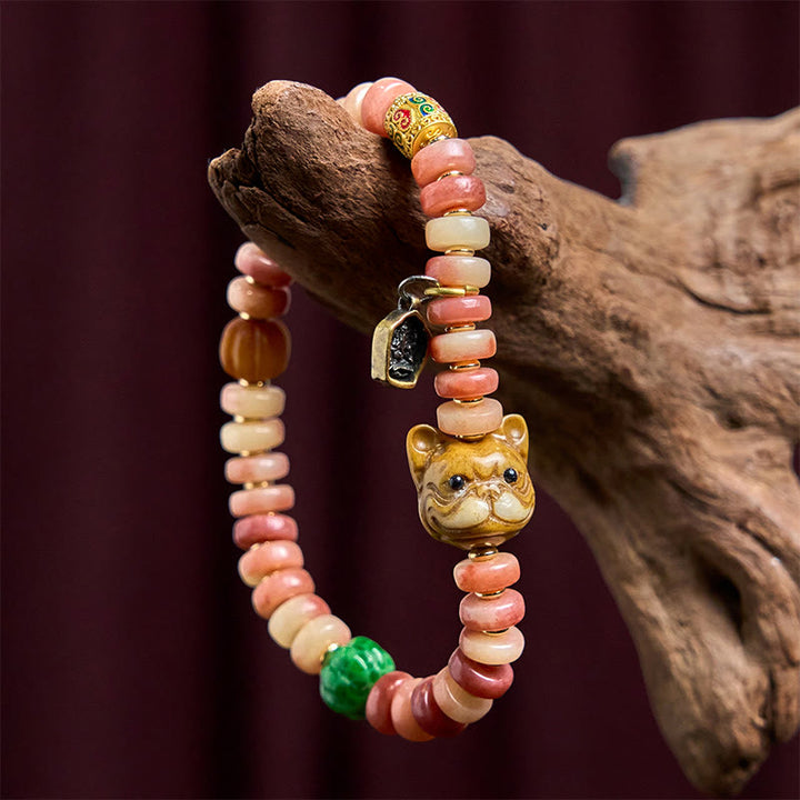 Buddha Stones Natürliches tibetisches Kamelknochen-Armband mit violetten Blutperlen und Mops-Glücksbringer