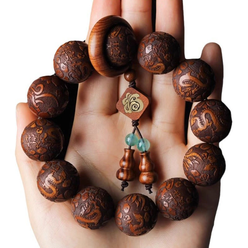 Buddha Stones Natürliche Schnitzerei Drache und Phönix Fu Charakter Kürbis Rosenholz Perlen Wärme Armband
