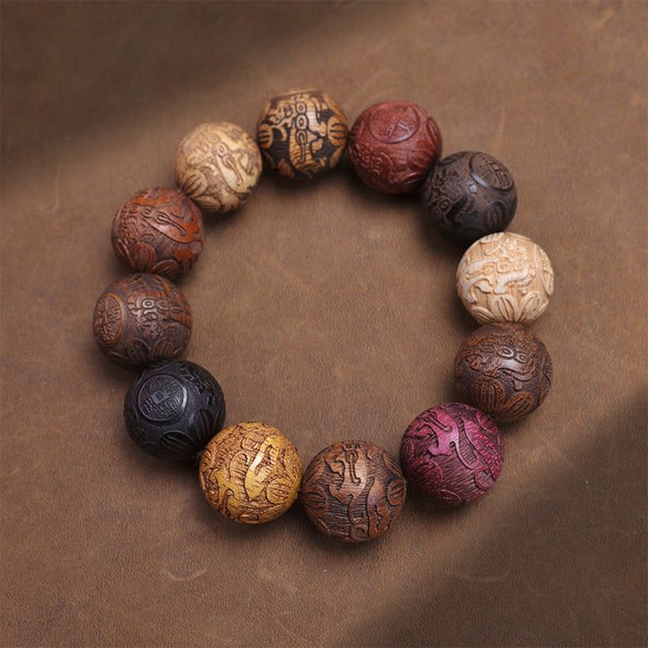 Buddha Stones, die Sandelholz schnitzen, chinesisches Sternzeichen, glückverheißender Drache, Phönix, Fu-Charakter, Heilungsarmband