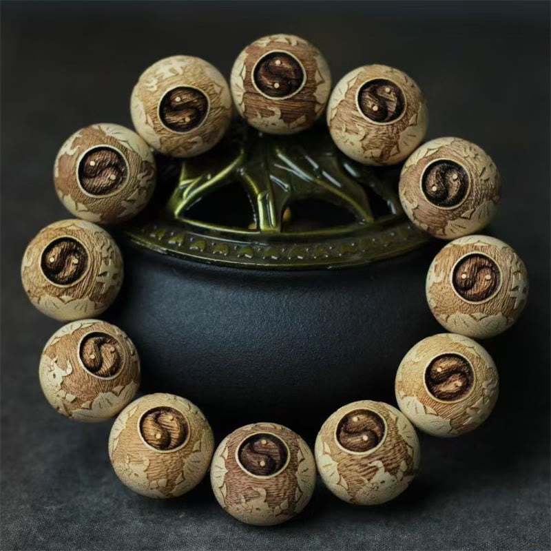 Buddha Stones, Kampferholz, Yin-Yang-Ochsengravur, Klarheit - Kampferholz (Handgelenkumfang 14–17 cm) - image 1