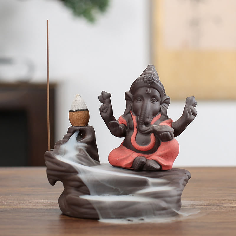 Buddha Stones, Ganesh, Elefant, lila Ton, Rückfluss-Rauchbrunnen, Schutzstab, Weihrauchbrenner - Orange 10,1 x 11 cm - image 1