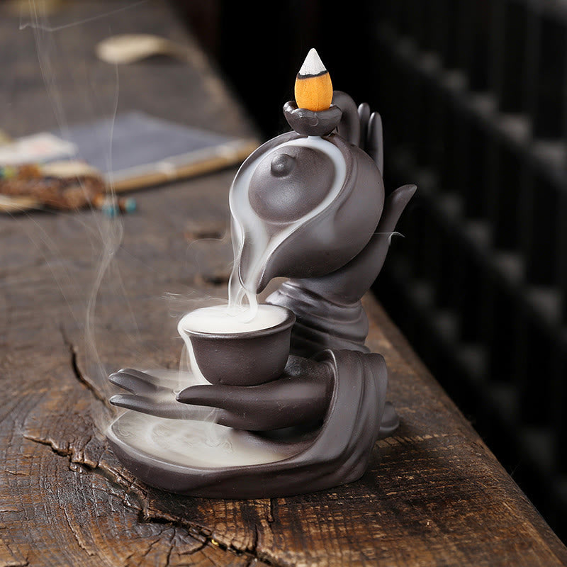 Buddha Stones, Buddha-Hand, die Teekanne und Tasse hält, Keramik-Rückfluss-Rauchbrunnen, heilende Weihrauchbrenner-Dekoration - Braun Schwarz 13.7*9*13,9 cm - image 1