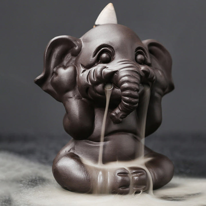 Buddha Stones, süßer Elefant, lila Ton, Rückfluss-Rauchbrunnen, Friedensheilung, Weihrauchbrenner, Dekoration - image 16