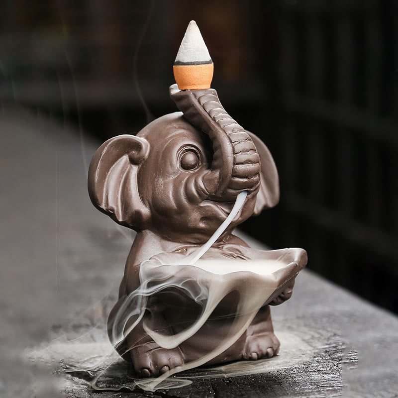 Buddha Stones, kleiner Elefant, hält Blatt, lila Ton, Rückfluss-Rauchbrunnen, heilende Weihrauchbrenner-Dekoration - image 1