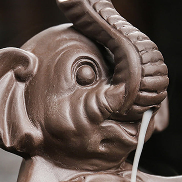 Buddha Stones, kleiner Elefant, hält Blatt, lila Ton, Rückfluss-Rauchbrunnen, heilende Weihrauchbrenner-Dekoration - image 11