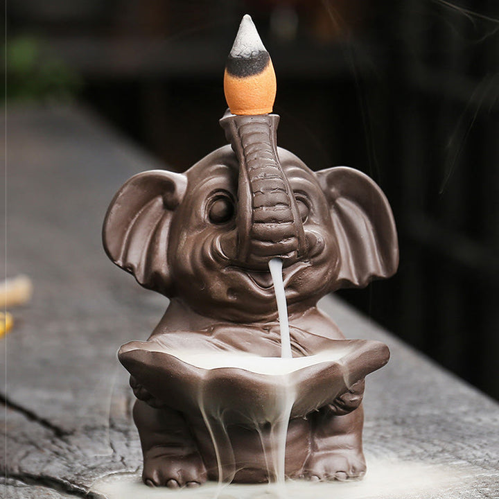 Buddha Stones, kleiner Elefant, hält Blatt, lila Ton, Rückfluss-Rauchbrunnen, heilende Weihrauchbrenner-Dekoration - image 8