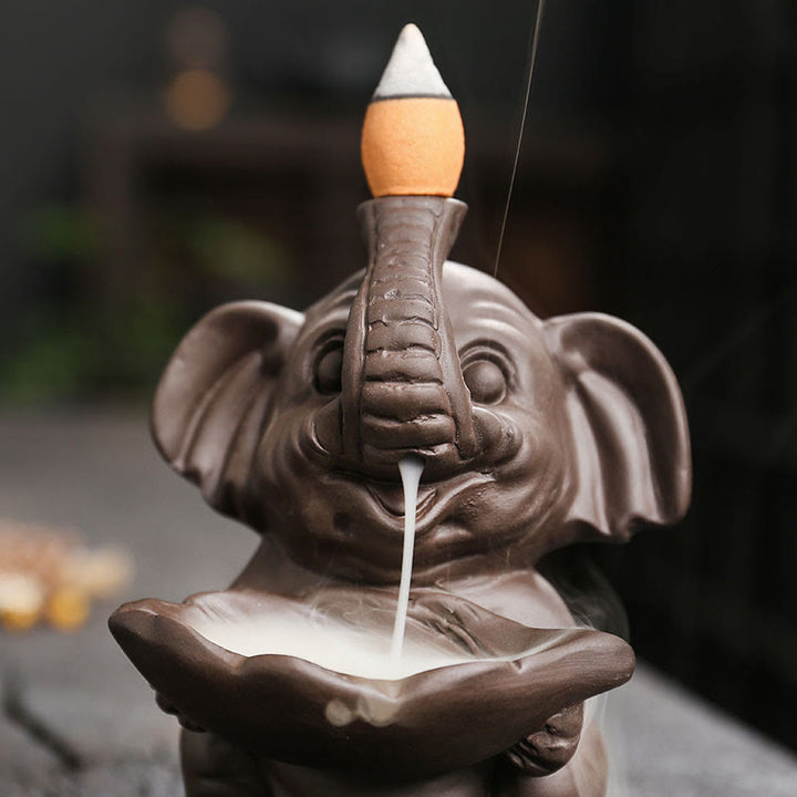 Buddha Stones, kleiner Elefant, hält Blatt, lila Ton, Rückfluss-Rauchbrunnen, heilende Weihrauchbrenner-Dekoration - image 9