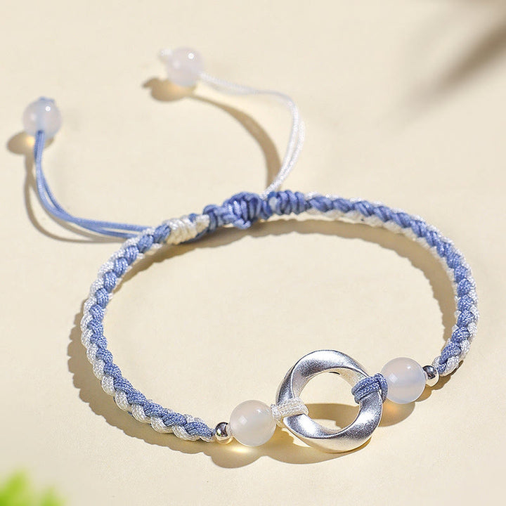 Buddha Stones Schutzarmband aus 925er Sterlingsilber mit Mobius-Perlen aus weißem Achat und geflochtener Schnur - image 1