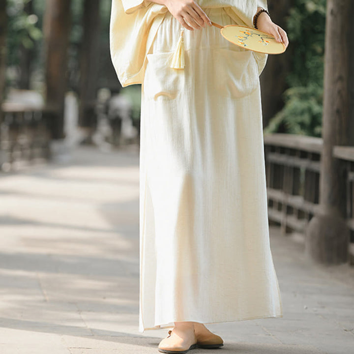 Buddha Stones Damenrockhose mit einfarbigem Saum und Schlitzdesign und Taschen - image 1