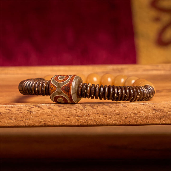 Buddha Stones Tibetisches Bodhi-Samen-Dzi-Perlen-Kokosnussschalen-Weisheitsarmband