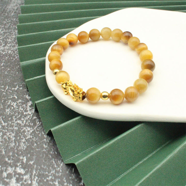 Buddha Stones, verschiedene Farben, Tigerauge-Perlen, Pixiu-Armband für Reichtum und Mut - Goldenes Tigerauge (Handgelenkumfang: 17–19 cm) - image 26