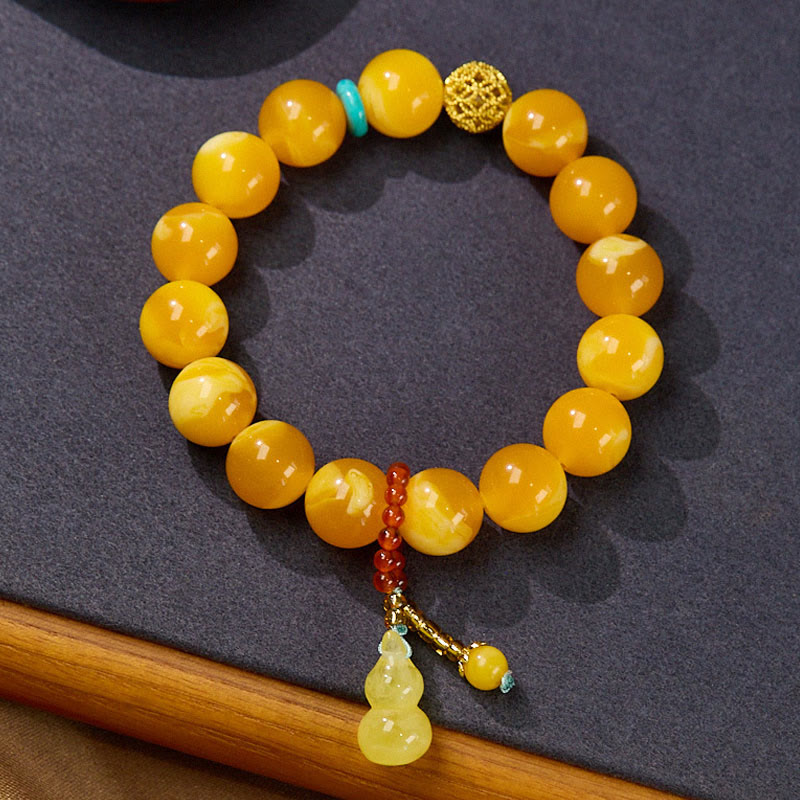 Buddha Stones Bernsteinkürbis Mehrschichtiges Vertrauensarmband - 12 mm Bernstein (Handgelenkumfang: 14–16 cm) - image 1