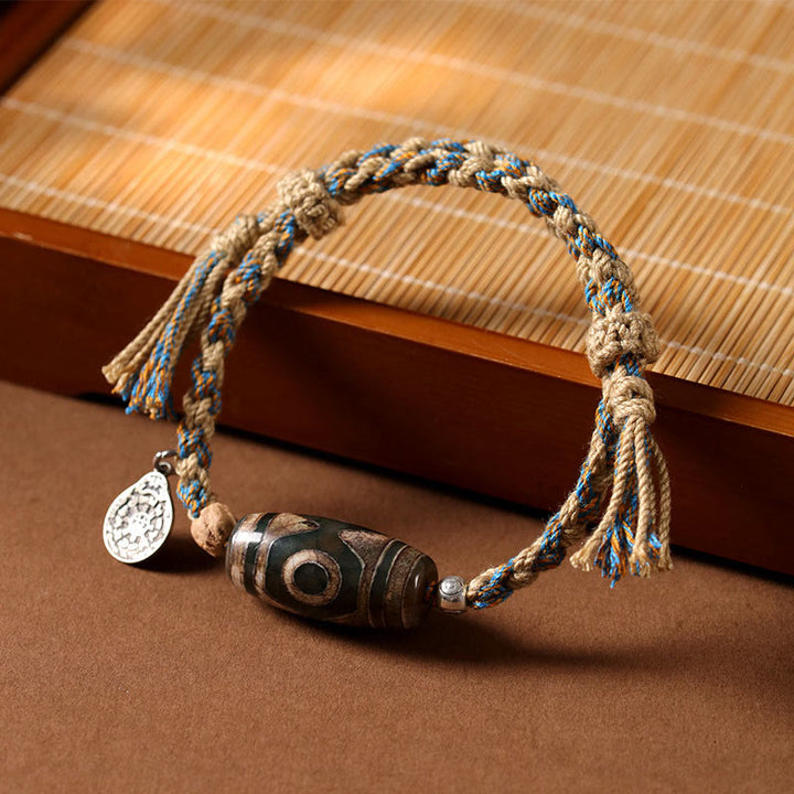 Buddha Stones Handgefertigtes tibetisches Dzi-Perlen-Armband zum Schutz des Reichtums, geflochtene Schnur - Dzi-Perle (Handgelenkumfang 14–16 cm) - image 1
