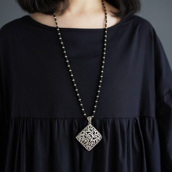 Buddha Stones – Einfarbiges Midikleid aus Baumwolle mit plissiertem Design, Rundhalsausschnitt und halben Puffärmeln - image 37