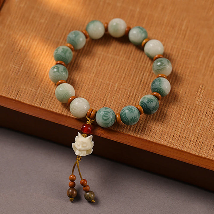 Buddha Stones, Farbverlauf, Bodhi-Samen, Om Mani Padme Hum, geschnitztes Zakiram-Friedensarmband - image 11