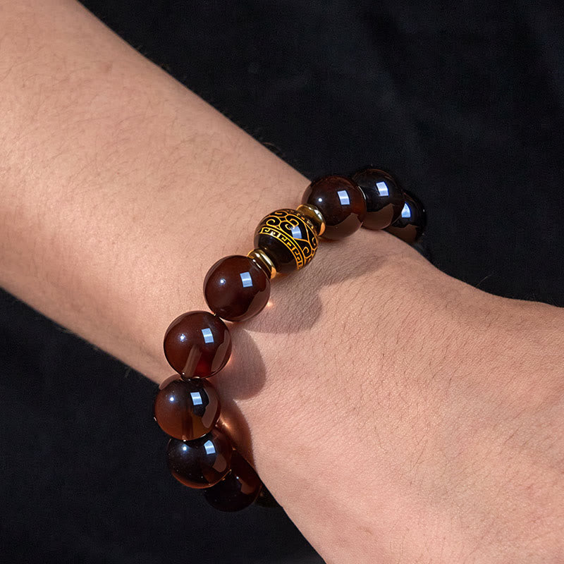 Buddha Stones Eisobsidian Sanskrit-Mutarmband mit Goldprägung