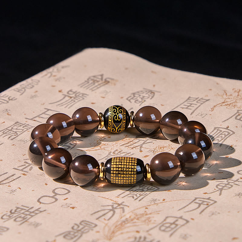 Buddha Stones Eisobsidian Sanskrit-Mutarmband mit Goldprägung