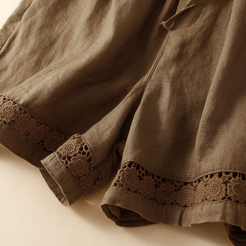 Buddha Stones - Unifarbene Shorts aus Baumwollleinen mit hohlem Spitzendesign und Taschen - image 53