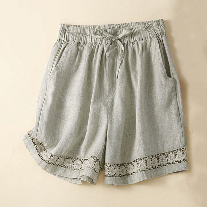 Buddha Stones - Unifarbene Shorts aus Baumwollleinen mit hohlem Spitzendesign und Taschen - Beige - US12， UK/AU16，EU44 (3XL) - image 1