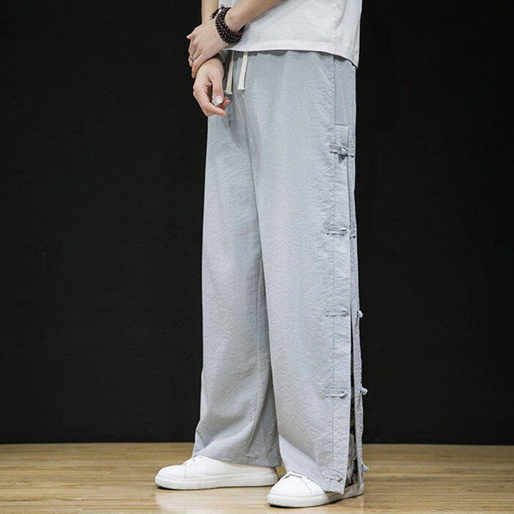 Buddha Stones Lässige Patchwork-Herrenhose mit weitem Bein und Taschen im Kranichmuster mit Froschknopf-Design - image 14