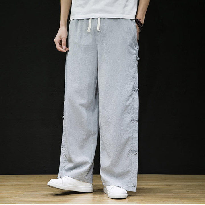 Buddha Stones Lässige Patchwork-Herrenhose mit weitem Bein und Taschen im Kranichmuster mit Froschknopf-Design - image 17