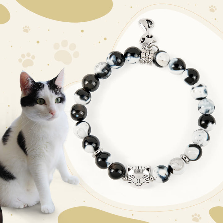 Buddha Stones Liebesarmband mit Feuerachat-Perlen, Schwarz-Weiß-Katze - Schwarz-weiße Katze (Handgelenkumfang 15–16 cm) - image 0