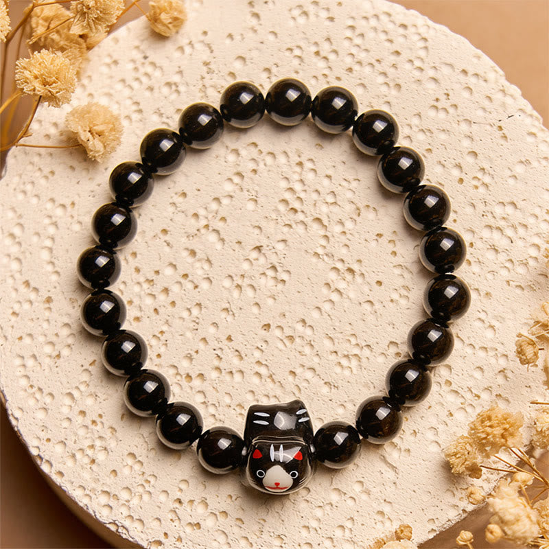 Buddha Stones Schwarze Katze, natürlicher schwarzer Onyx, Keramik, Kätzchen-Stützarmband - image 1
