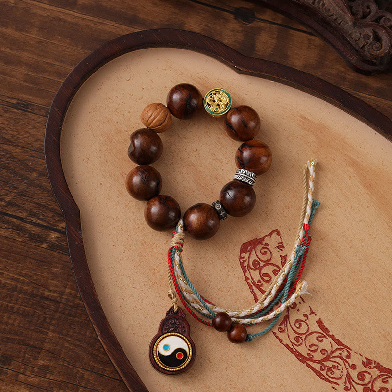 Buddha Stones Tibet Lightning Struck Jujube Wood Yin Yang Glücksarmband - Vom Blitz getroffenes Jujube-Holz (Handgelenkumfang: 18–23 cm) - image 1