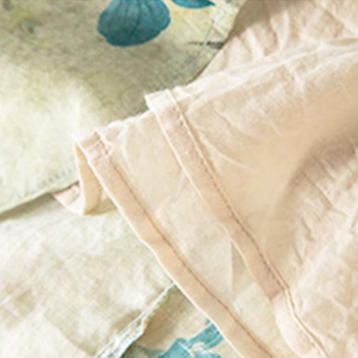 Buddha Stones – Midikleid mit halblangen Ärmeln, farblich kontrastierendem Blumenmuster und Taschen - image 12