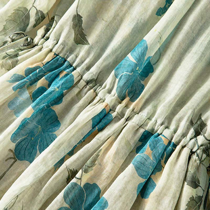 Buddha Stones – Midikleid mit halblangen Ärmeln, farblich kontrastierendem Blumenmuster und Taschen - image 3