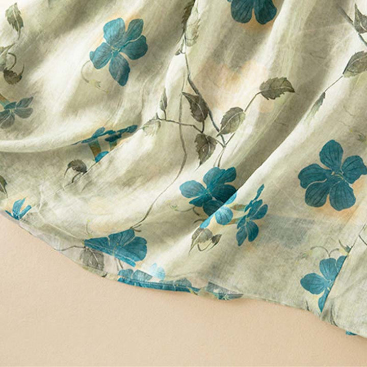 Buddha Stones – Midikleid mit halblangen Ärmeln, farblich kontrastierendem Blumenmuster und Taschen - image 5