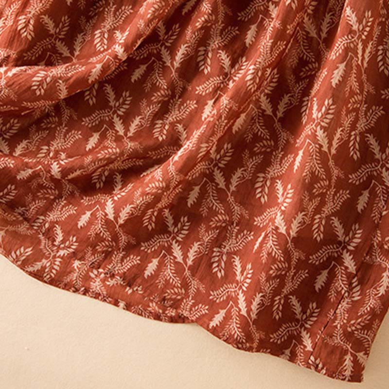 Buddha Stones – Midikleid mit halblangen Ärmeln, farblich kontrastierendem Blumenmuster und Taschen - image 24