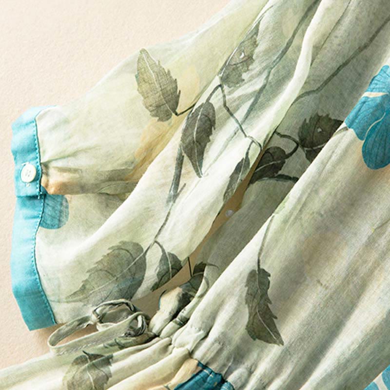 Buddha Stones – Midikleid mit halblangen Ärmeln, farblich kontrastierendem Blumenmuster und Taschen - image 9