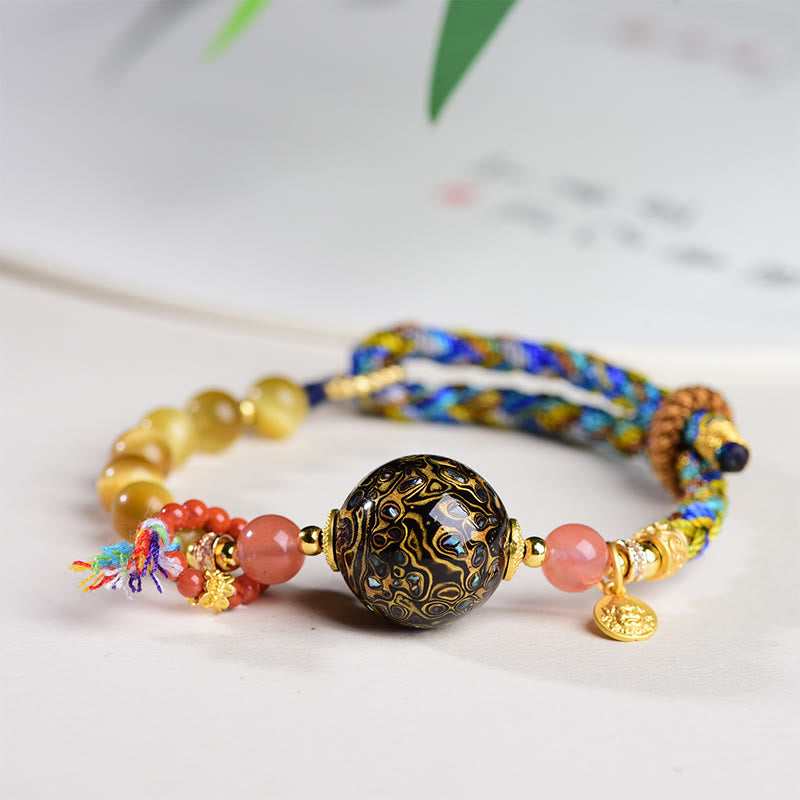 Buddha Stones Tibetische Lackperle Handgewebtes Tigerauge-Stein-Schutzarmband - Lackperlen & Tigerauge (Handgelenkumfang: 15–25 cm) - image 0