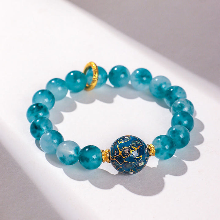 Buddha Stones 10 mm natürliches blaues Chalcedon-Perlenarmband - image 1