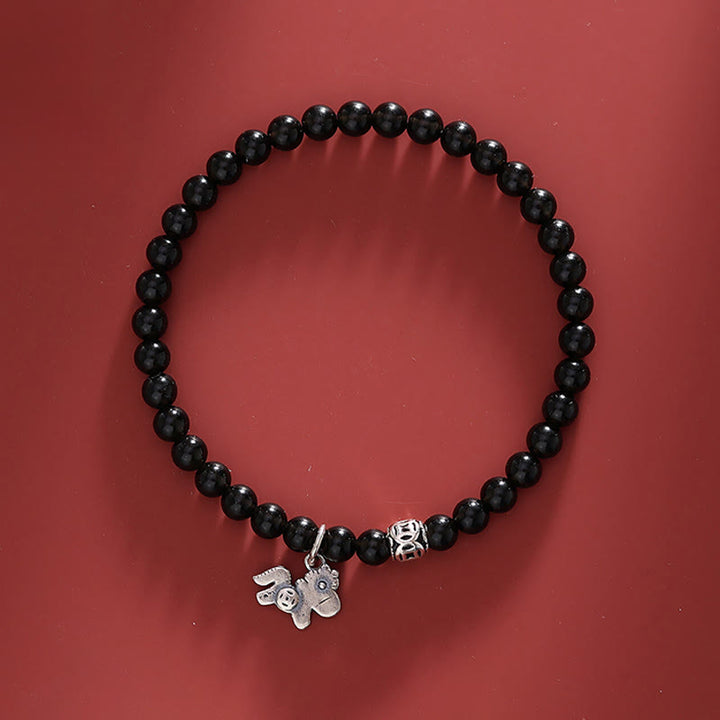 Buddha Stones ​​– Jahr des Pferdes – Armband aus 925er Sterlingsilber und natürlichem schwarzem Obsidian - Pferd, 925er Sterlingsilber und schwarzer Obsidian (Handgelenkumfang 16-17 cm) - image 0