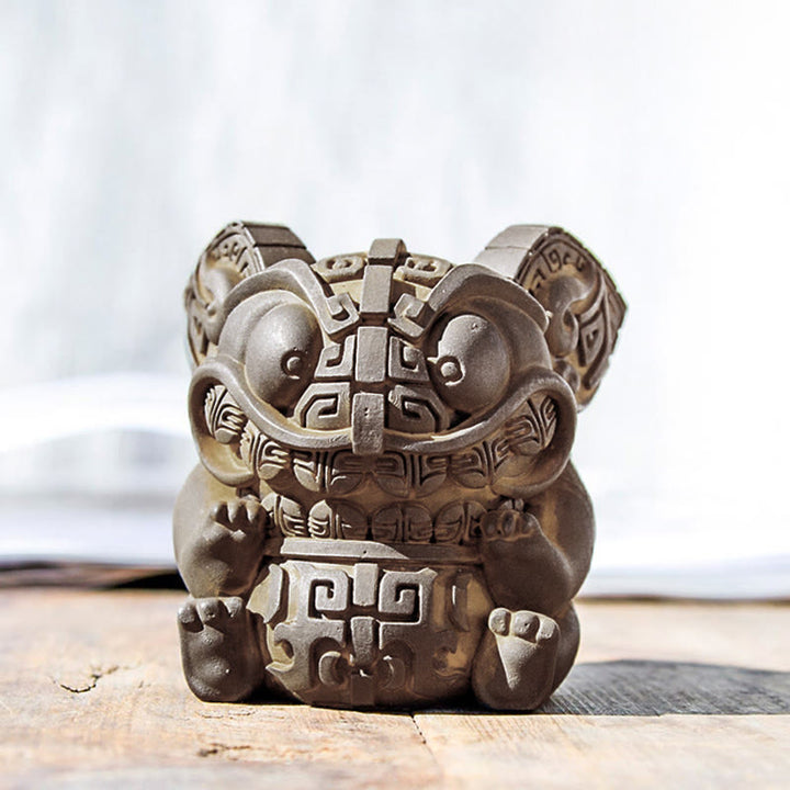 Buddha Stones aus handgefertigtem Gold, die ein Ungeheuer verschlingt – Eisenpulver-Rostguss-Harz-Statue – Heimdekoration - image 0