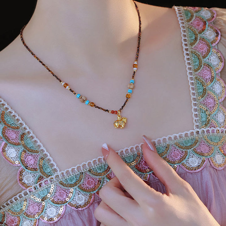 Buddha Stones -Tigeraugen-Schutz-Halskette mit Anhänger – Goldenes Jahr des Pferdes - image 4