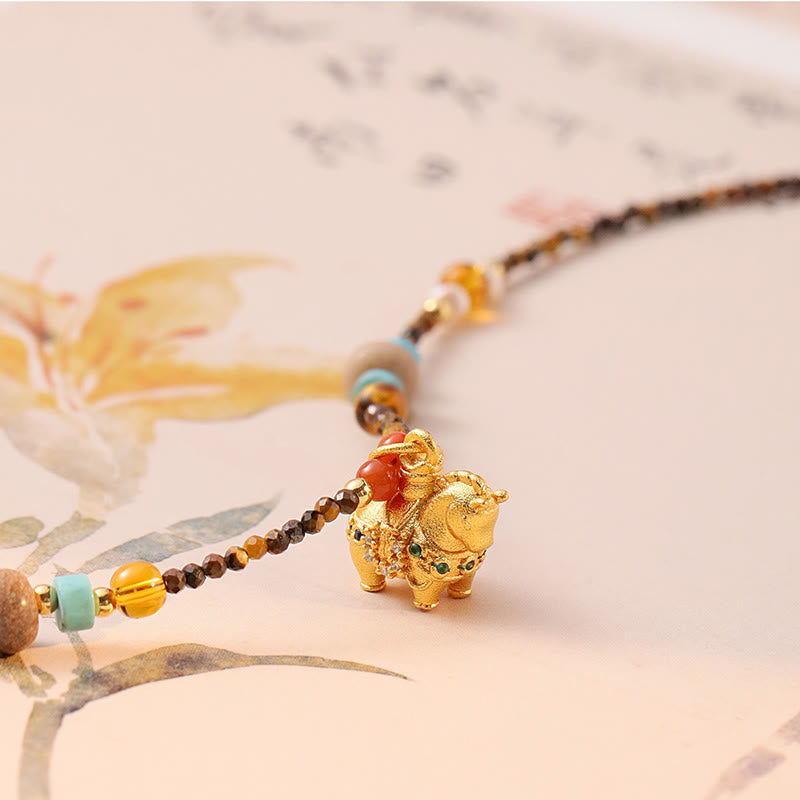 Buddha Stones -Tigeraugen-Schutz-Halskette mit Anhänger – Goldenes Jahr des Pferdes - image 2