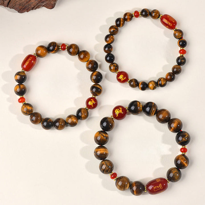 Buddha Stones ​​12 Chinesische Tierkreiszeichen Natürliches Tigerauge Roter Achat Schutzarmband - image 1