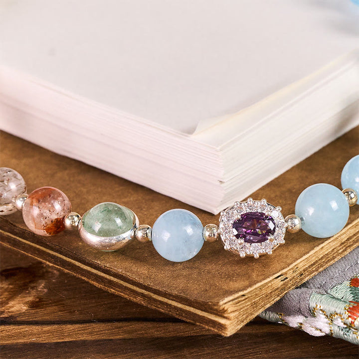 Buddha Stones ​​8 mm Blauer Chalcedon Super Seven Kristall Energie Schlüsselanhänger Handy-Hängedekoration - image 1