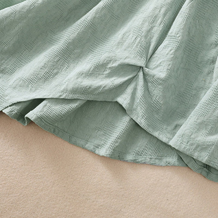 Buddha Stones ​​Jacquard-Baumwollhemd mit unregelmäßigem Saum und Faltenmuster, langärmelig - image 37